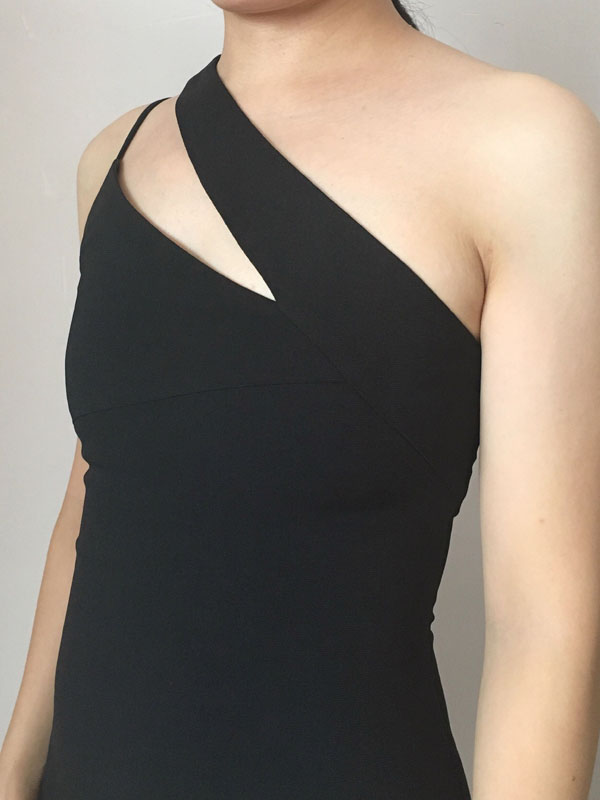 diagonal strap across neckline